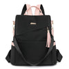Black vegan leather backpack with pink accents and a laptop compartment.