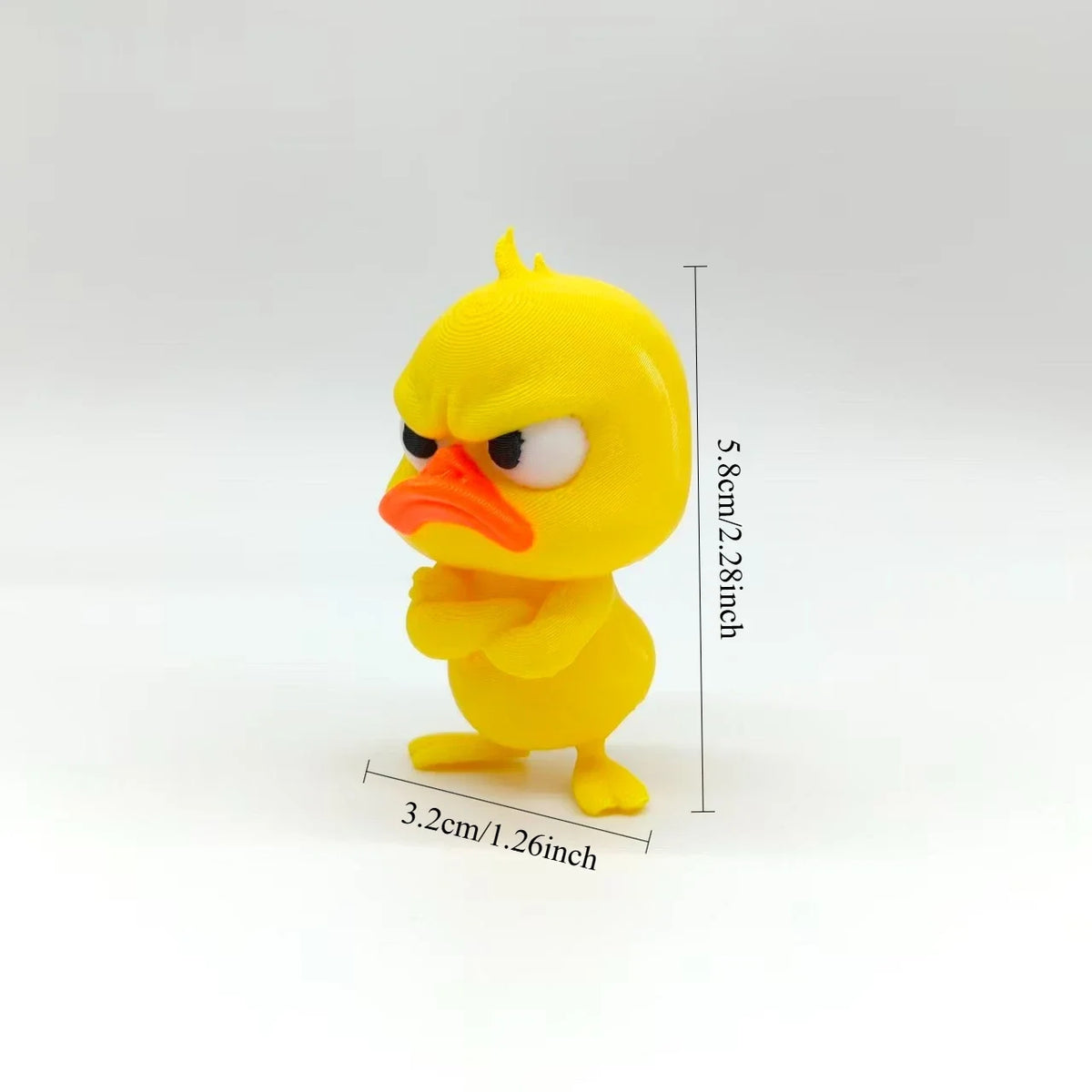 A yellow 3D printed duck statue decoration with an orange beak and angry expression.