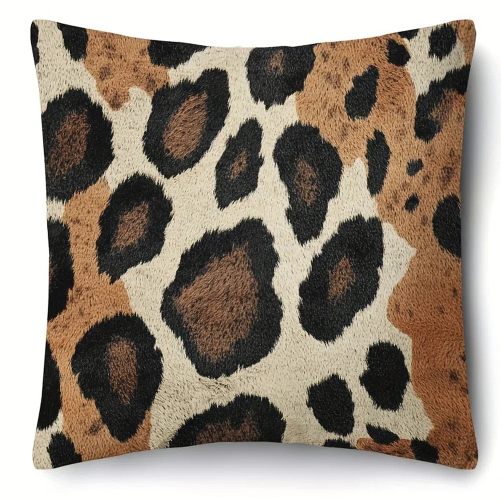 A square decorative pillowcase featuring a brown and black leopard print pattern on a beige background.