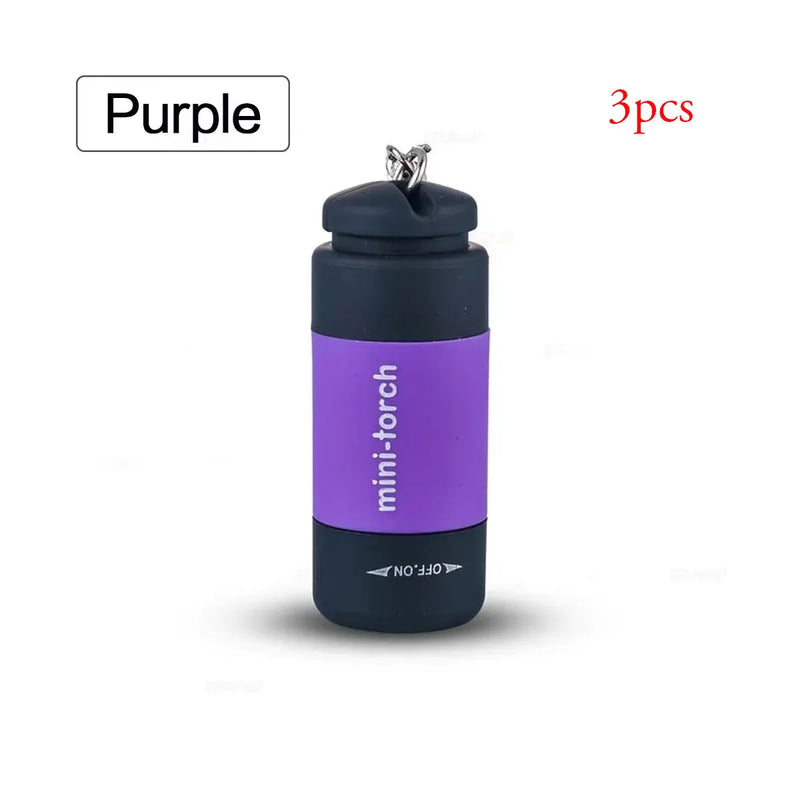 Mini lampe de poche USB rechargeable sur porte-clés