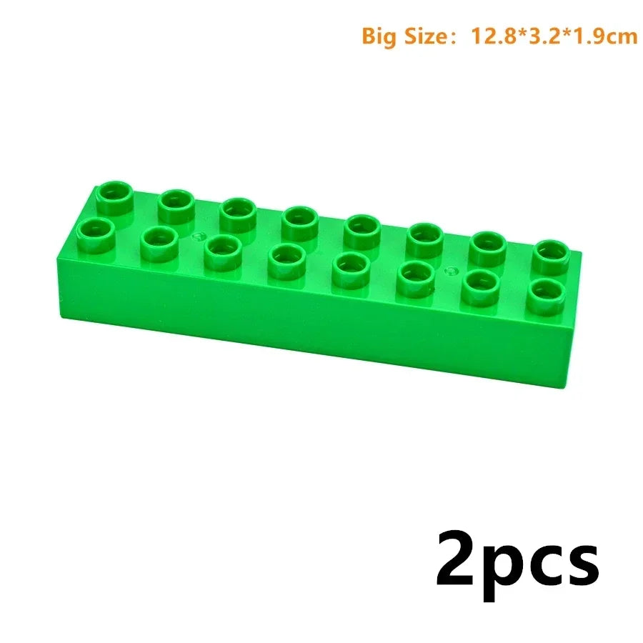 A green plastic building block set with 12 pieces, shown from the side.