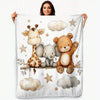 A white blanket featuring a watercolor print of a giraffe, an elephant, and a teddy bear.