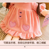 A pink rabbit fairy plush doll with ruffled sleeves and heart accents, shown against a light background.