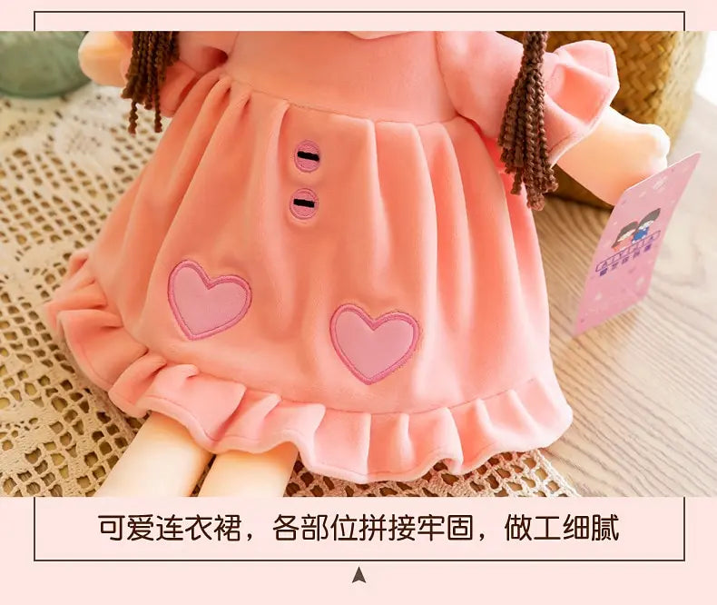 A pink rabbit fairy plush doll with ruffled sleeves and heart accents, shown against a light background.