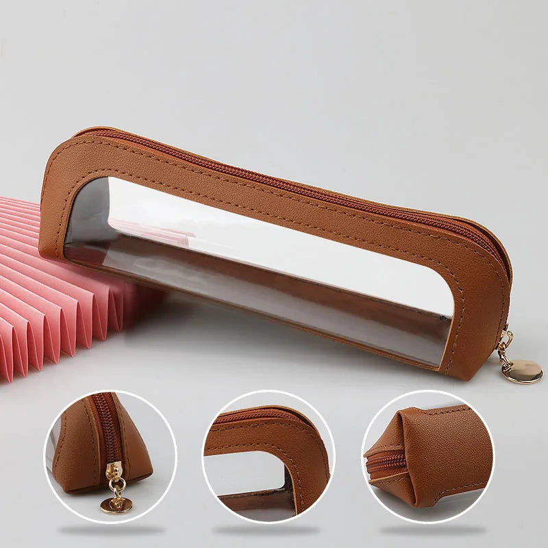 A brown leather travel makeup organizer pouch with a clear window, shown from multiple angles.