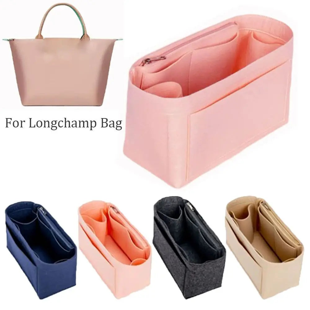 Various felt purse organizer inserts and a pink tote bag for storage