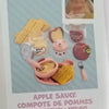 Miniature food accessories for a baby doll kit including apple sauce and other foods