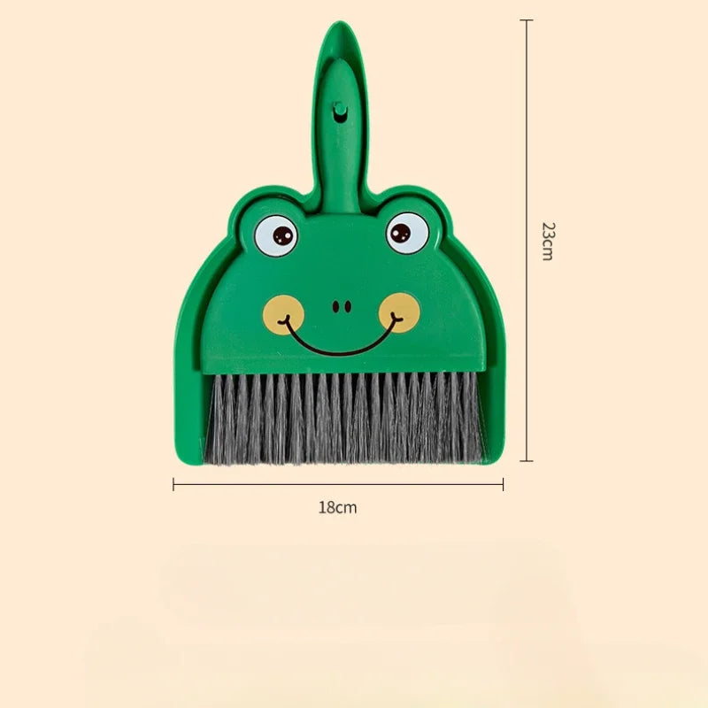 A green cartoon broom and dustpan set with a handle and bristles shown against a light background.