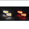 A pair of universal 12V motorcycle LED flowing turn signal indicators shown in black housing with yellow and red light patter