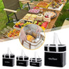 A set of black insulated lunch bags with white handles and a logo, shown next to a spread of food.