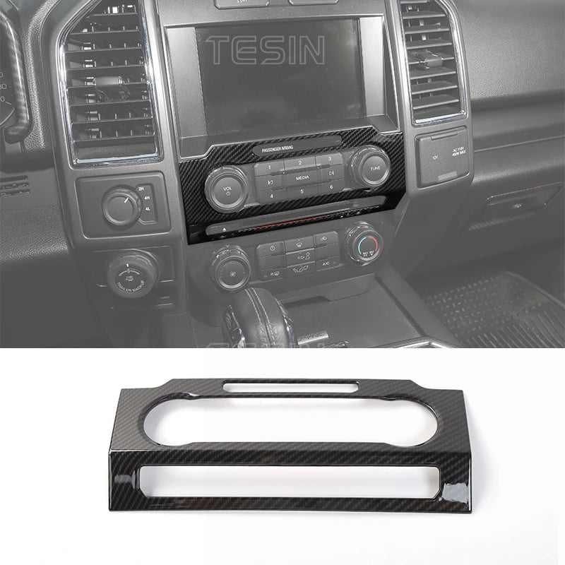 Carbon fiber grain center console trim cover for Ford F-150 vehicle interior.