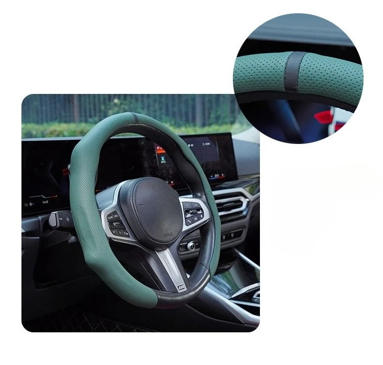 A close-up view of a green perforated leather steering wheel cover installed on a car's steering wheel.