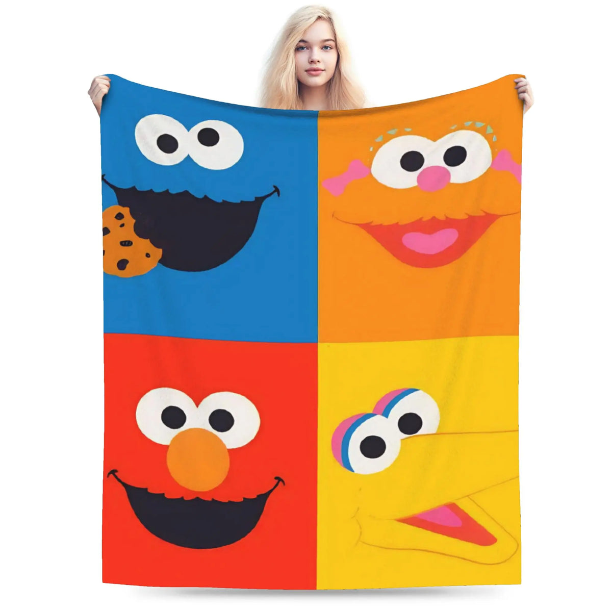 A colorful flannel throw blanket featuring smiling faces from Sesame Street characters.