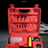 Red manual vacuum pump kit for automotive use with a gauge and various tools.