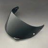 A black replacement helmet visor with an anti-fog coating shown from a side angle.