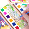 A hand is painting a colorful illustration in an all-in-one doodling experience book for kids.