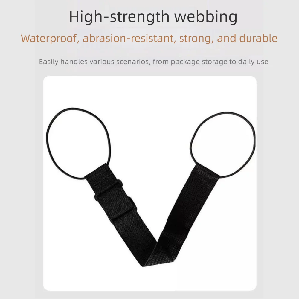 A black adjustable luggage strap with a quick-release buckle shown against a white background.