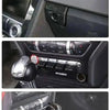 Close-up shots of carbon fiber grain decorative trim and interior components for a Ford Mustang