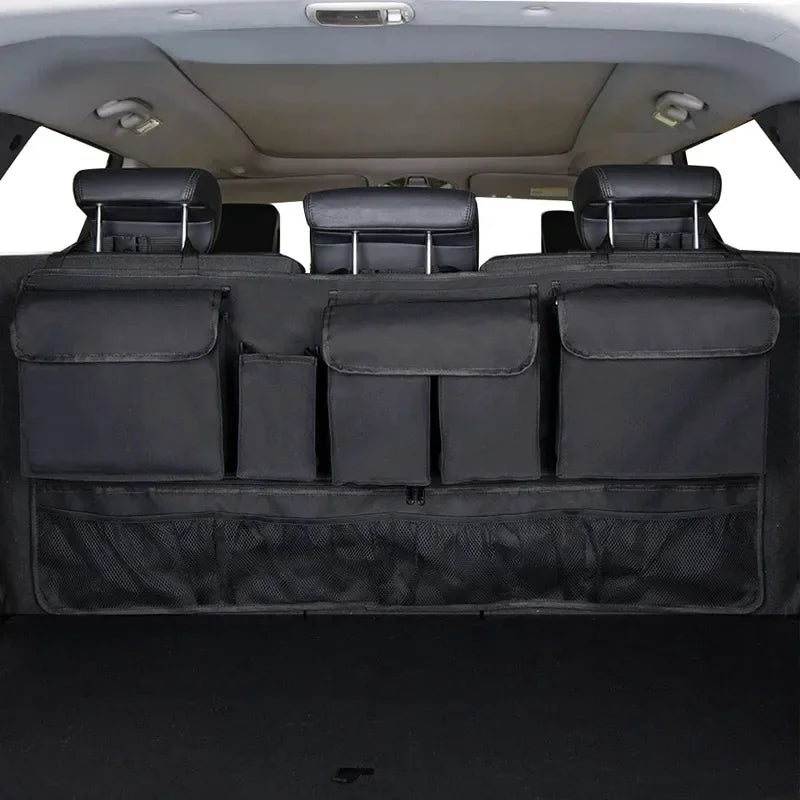 Organisateur de coffre de voiture noir imperméable avec housses rembourrées et compartiments de rangement.