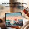 A hand is drawing on an iPad screen with a stylus, demonstrating the magnetic paper-feel screen protector.