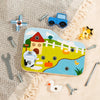 A wooden farm animal assembly toy featuring a tractor, various tools like a screwdriver and wrench, and colorful farm animals