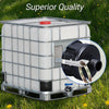 A white IBC tote drain adapter with a red cap and a black fitting is shown outdoors in green grass.