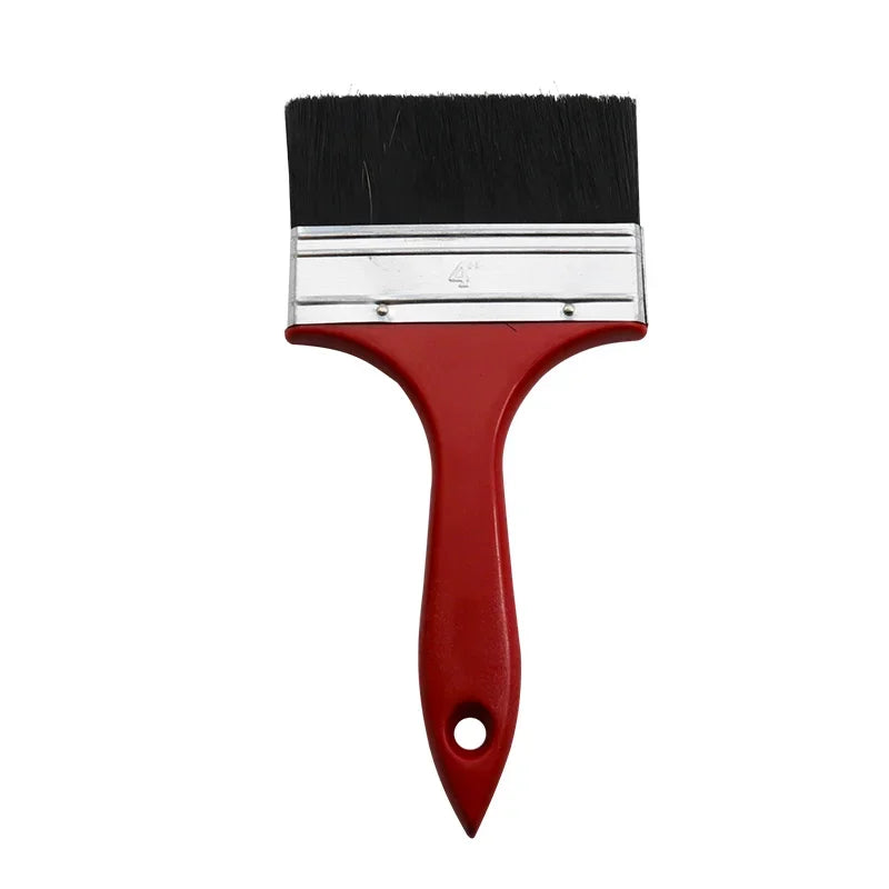 A black paint brush with a silver ferrule and a red plastic handle.