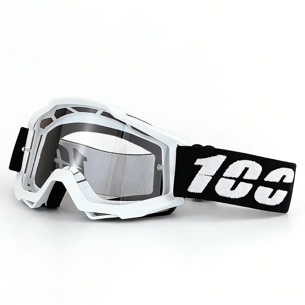 White off-road motorcycle goggles with black strap and clear lens