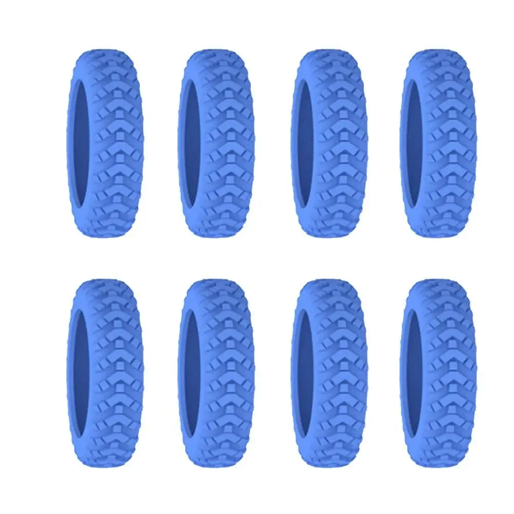 A set of six blue silicone luggage wheel protectors for quiet and scratch-free travel.
