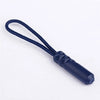 A dark blue replacement zipper pull with a nylon cord attached.