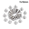 A collection of silver metal spike studs measuring 7x10mm arranged in a circular pattern.
