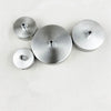 Three polished stainless steel ceiling mount canopies for pendant lights arranged horizontally.