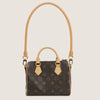 A brown synthetic leather bag strap for handbags and purses with a flap closure.