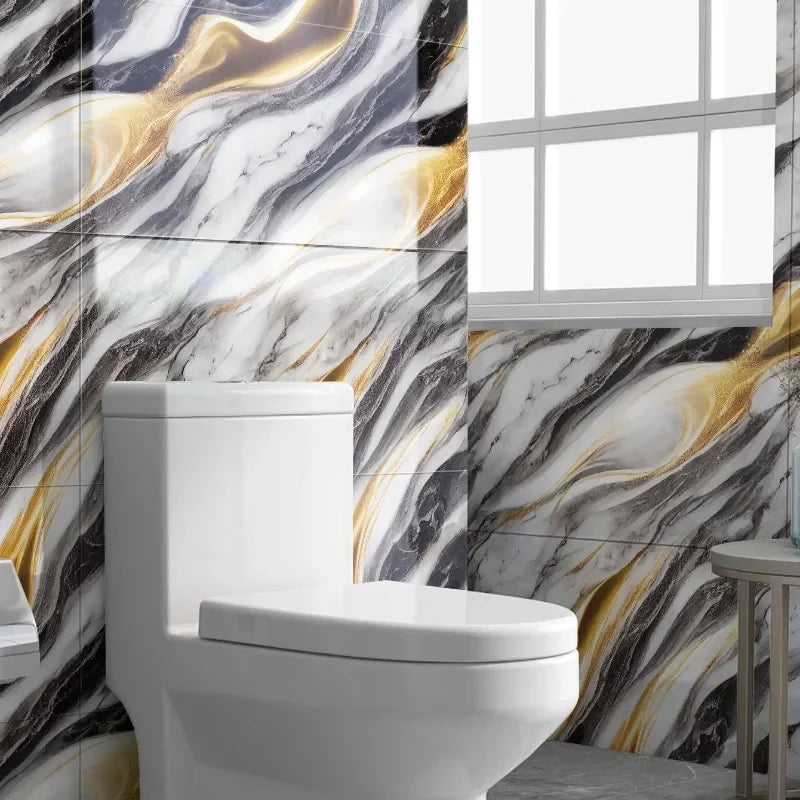 A modern white toilet in a bathroom featuring marble-patterned wall tiles with gold veining.