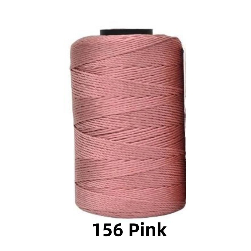 A spool of 1.5mm fine pink polyester thread for knitting and DIY crafts.