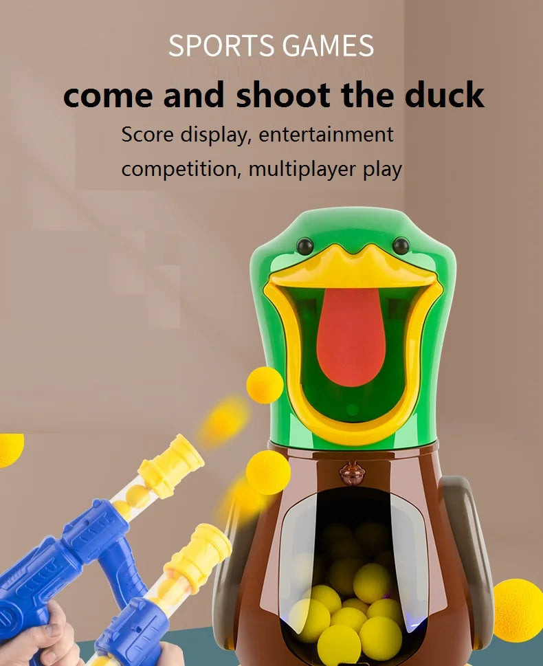 A hand is holding a blue air-powered dart gun aimed at a green duck shooting target game.