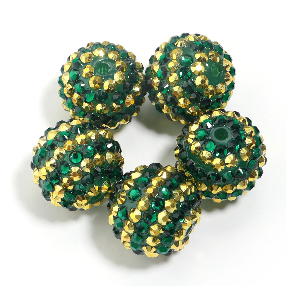A set of five resin rhinestone beads with a two-tone gold and green striped design.