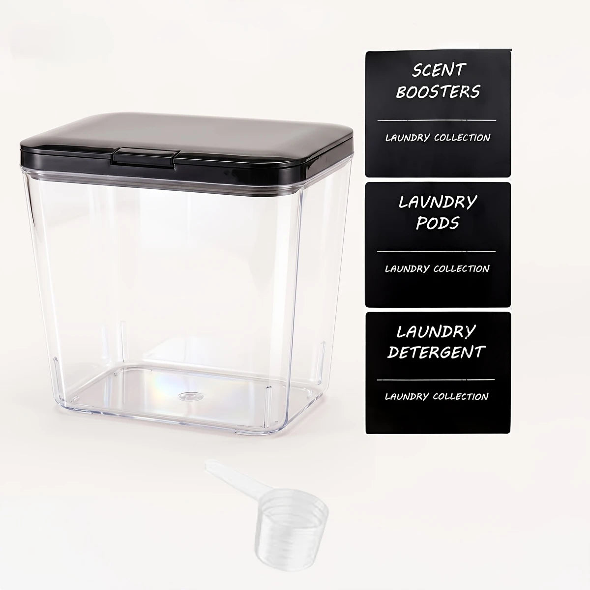 Clear plastic automatic pop-up laundry pod holder with a black airtight lid and three labeled detergent containers.