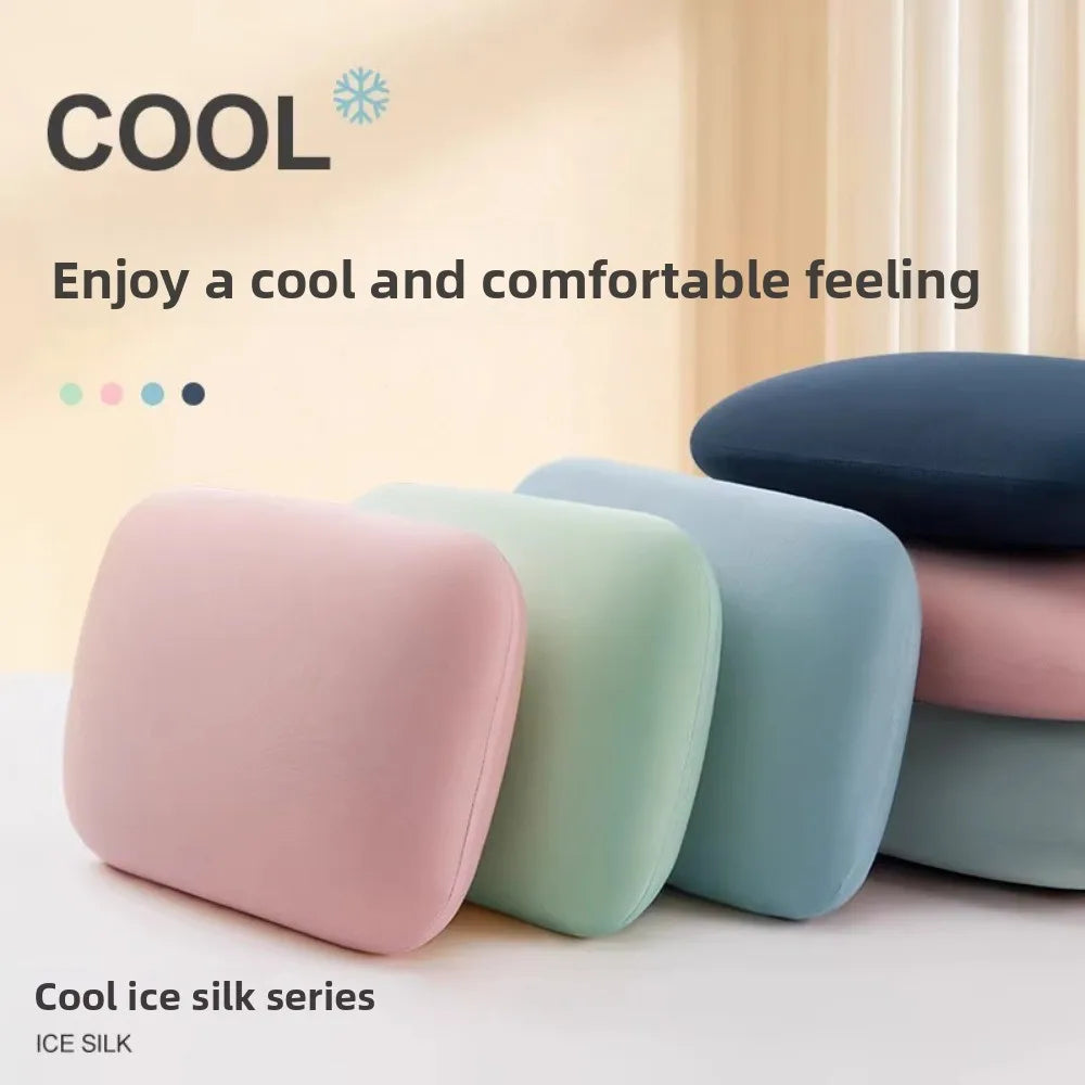 A stack of pastel-colored ice silk neck pillows showing various shades of pink, mint green, and blue.