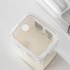 A clear plastic container showing yogurt filtration, demonstrating a visual transparent cover.