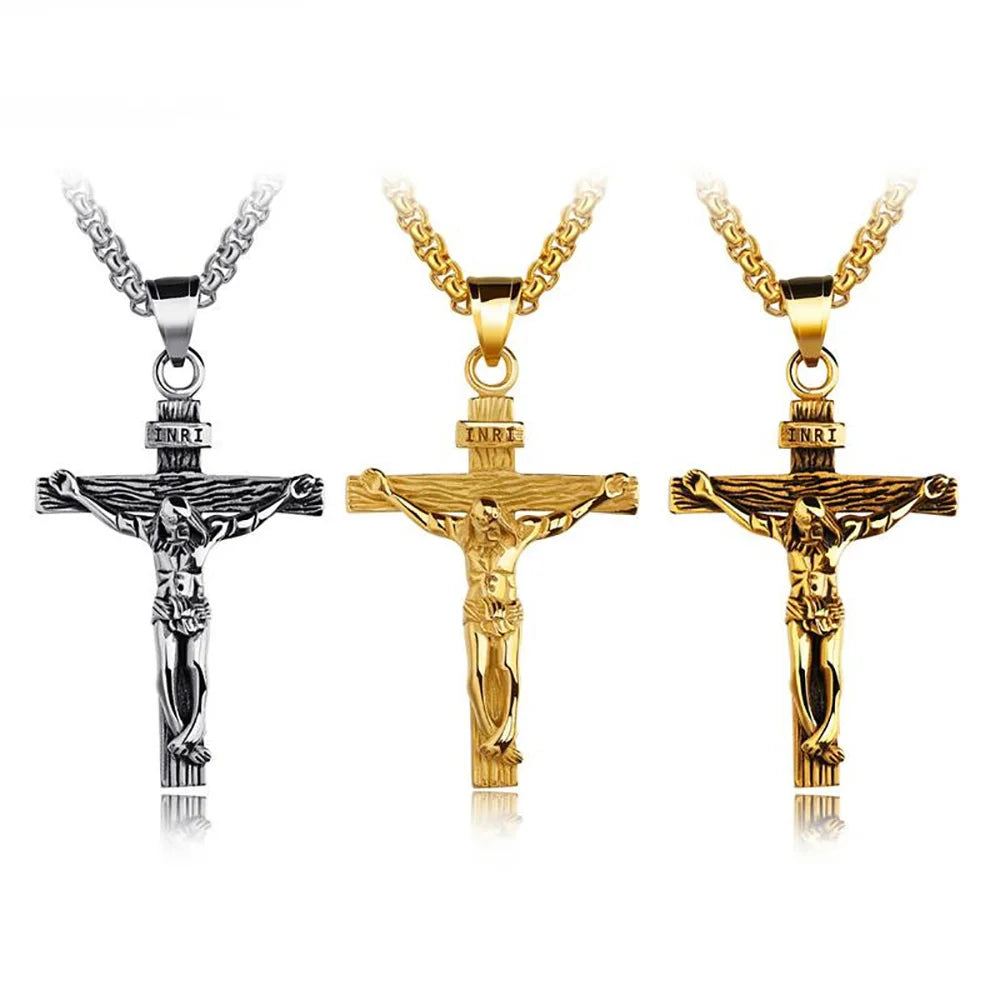 Three gold and silver cross pendant necklaces displayed side by side.