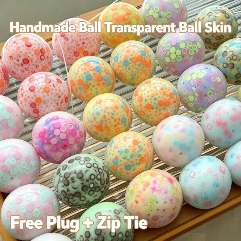 A collection of handmade transparent ball skins in various colors and patterns for a DIY stress relief kit.