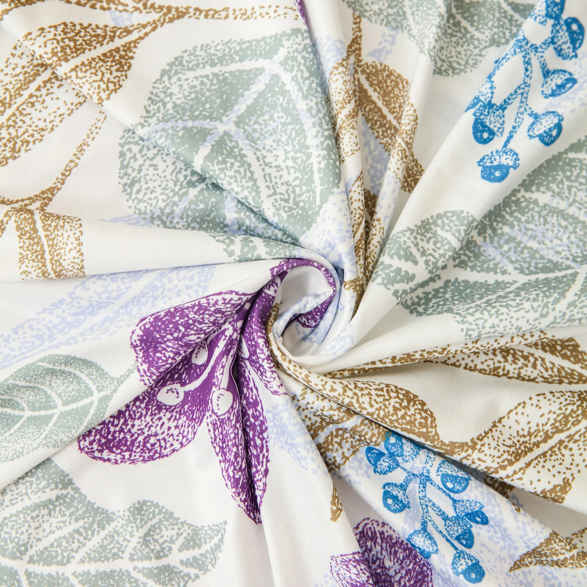 A close-up of a floral patterned fabric, featuring leaves in shades of green, brown, and purple on a white background.