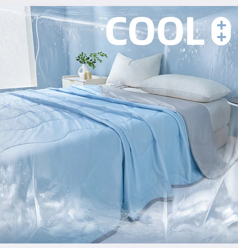 Light blue cooling quilt draped over a bed, with ice or mist effects in the background.