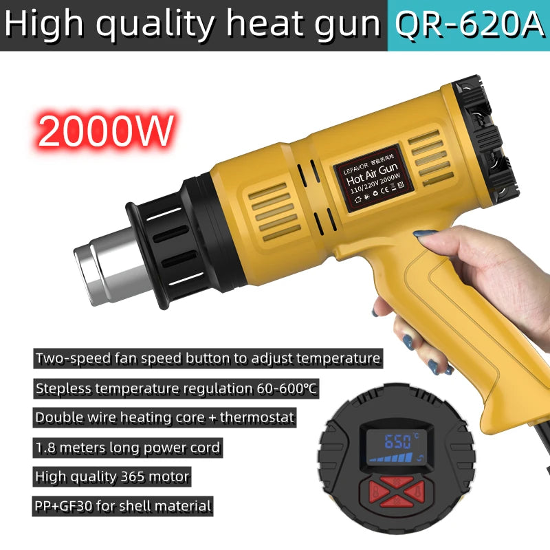 A yellow heat gun with a black handle and a digital temperature display is shown being held by a hand.