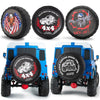 A blue RC crawler vehicle is shown with three round decals featuring a 4x4 truck, fire, and tools.