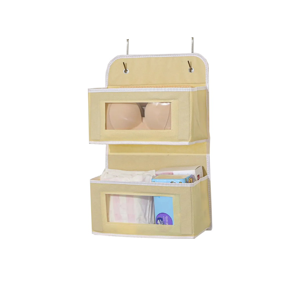 A yellow over-the-door hanging organizer with multiple compartments for storing various items.