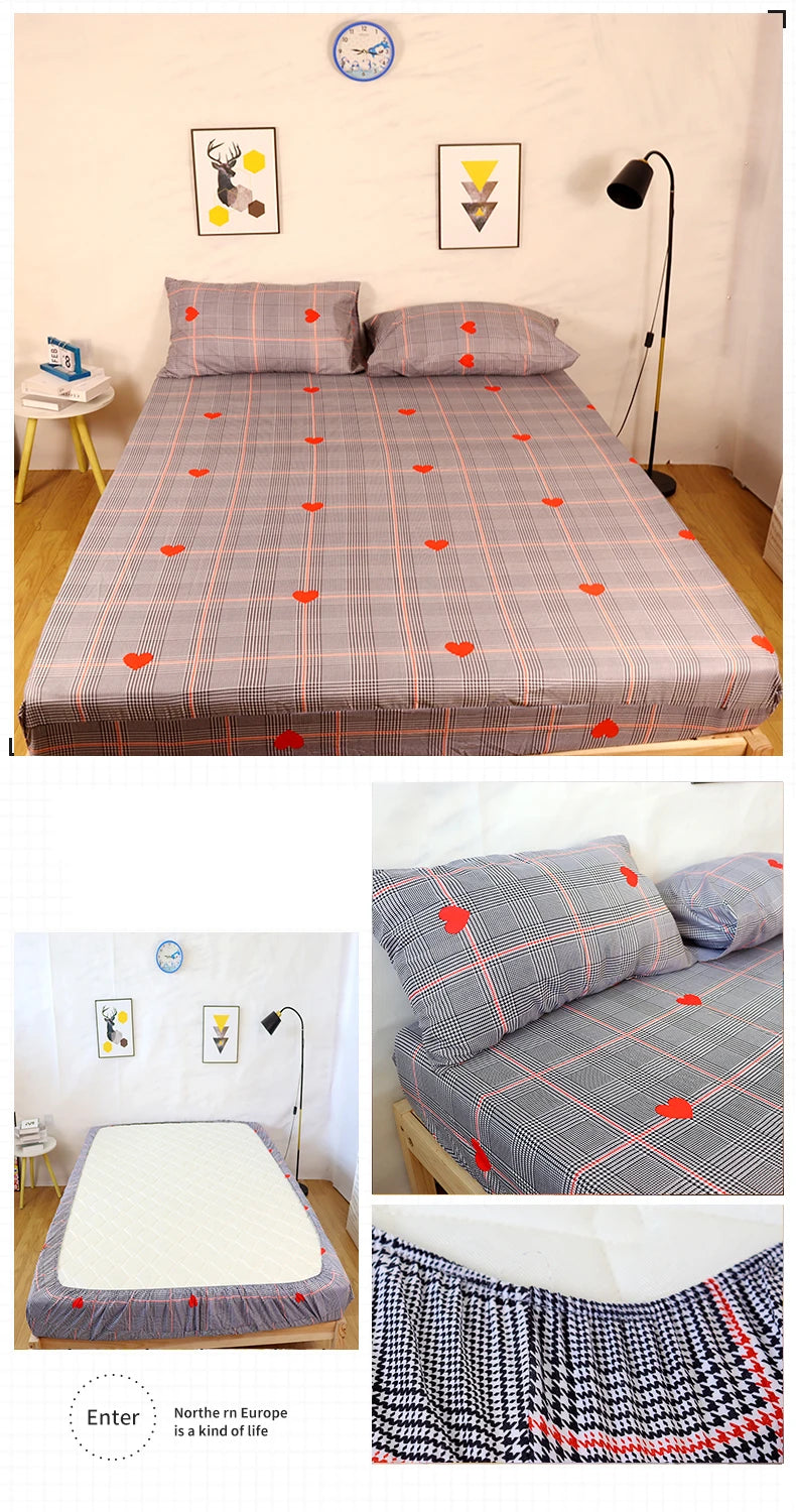 A fitted bed sheet featuring a marbled print with red hearts on a gray and pink background.