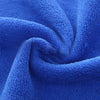 A close-up of a deep blue ultra-absorbent microfiber car drying towel folded and textured.