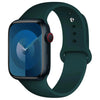A dark green silicone sport band for an Apple Watch displayed on a white background.